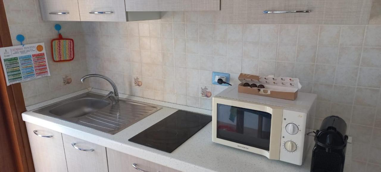 Fronte Mare Attico Indipendente Ed Esclusivo Con Terrazza Panoramica Daire Isola Rossa Dış mekan fotoğraf